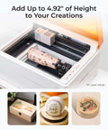 xTool M1 Ultra desktop laser engraver, white base with orange lid, engraving a tumbler.