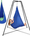 Swing Stand Frame With Sensory Swing And Pod Swing For Kids Heavy Duty X Frame Indoor Outdoor Sensory Hammock With Stand 330 Lbs Capacity Kid Friendly Autism Fun For Home Backyard Park Blue, showing child using blue sensory swing on metal frame.