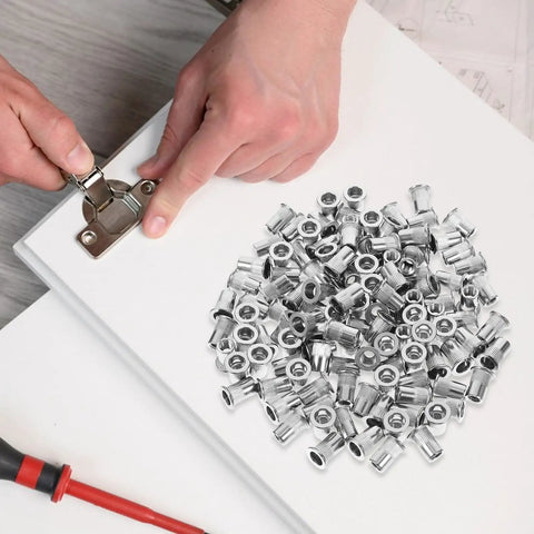 Stainless Steel Rivet Nuts Kit with 120 Pieces Flat Head Knurled Threaded Inserts for quick secure connections shown with installation.