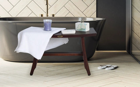 Teak Shower Bench 28 Inch Waterproof Wooden Seat For Inside Shower Spa Quality Chair with towel and toiletries near tub