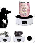 Badass Electric Powered 360 Motorized Tumbler Display Stand with glitter cup, photographer silhouette, and USB connection.