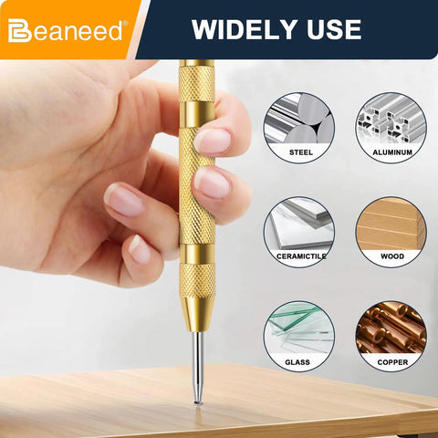 Built Tough Automatic Center Punch 2 Pack Spring Loaded Steel Marking Tool Includes Spare Tips being used on wood surface.