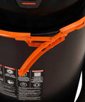 Compact Portable Dust Collector With A Killer 1.48 HP Motor Generating 108 CFM Of Insane Suction showing the secure latch and warning labels.