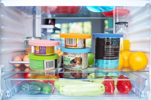 Universal Silicone Can Lids For Dog And Cat Food, 3 Pack With Spoon, Multi Colored Set on cans in fridge