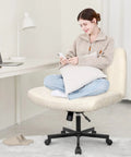 Woman sitting cross-legged on Cross Legged Comfy Office Desk Chair With Wheels Armless Swivel Fabric Seat Wide Space Saving Vanity Chair