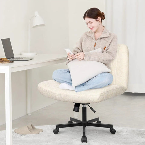 Woman sitting cross-legged on Cross Legged Comfy Office Desk Chair With Wheels Armless Swivel Fabric Seat Wide Space Saving Vanity Chair