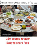 Kick Up Your Hosting Game With This 39 Inch Round Wooden Lazy Susan Rotating Serving Tray featuring food spread on a round table.