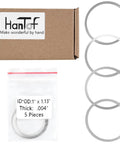 Top Shelf Barrel Nut Shim Kit With Free Float Spacers And Quick Adjustments.001 To.004 Inches, 5 steel shims in packaging.