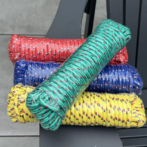 4 Pack 50 Feet Each Three Eighths Inch Polypropylene Rope Heavy Duty All Purpose Utility Line Weather Resistant Tie Downs For Camping, Fishing, Pulling And Outdoor Use Multicolor Red Yellow Blue Green, stacked on a chair.