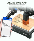 Kortek 10W Laser Engraver Desktop Cutter With Wireless App Control engraving bird design on wood with smartphone app interface.