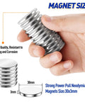 8-pack silver neodymium disc magnets with adhesive backing, 30x3mm, held in hand