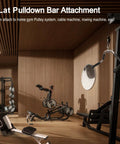 Pro Grade Lat Pulldown Bar Attachment in gym setup with cable machine and rower