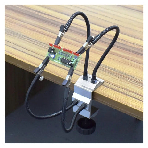 Pro Grade Four Arm Third Hand Soldering Stand with Adjustable Gooseneck Arms and Stainless Steel Alligator Clamps holding PCB