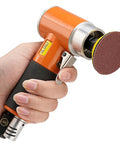 Hand holding 2 Inch Pneumatic Mini Orbital Sander Kit With 2 In 1 Air Right Angle Grinder Polisher Surface Prep Tool