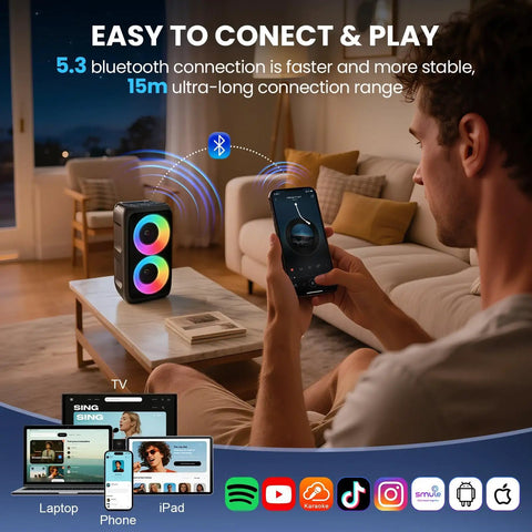 Person using phone to connect Karaoke Party Bluetooth Speaker With Dual Wireless Microphones Party Ready Floorstanding System With Lights TWS Pairing USB AUX And TF Card Support For Home Parties And Events via Bluetooth indoors.