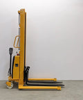Heavy Duty Wide Leg Semi Electric Pallet Stacker Built Like A Tank With A Rock Solid 2204 Lbs Capacity And A Sweet 138 Inch Lift Height For Confined Warehouses side view with nylon wheels