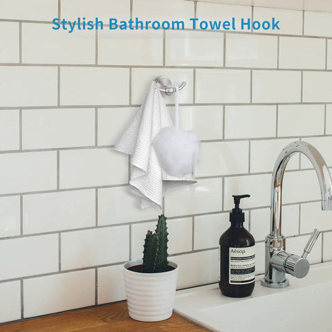 Brushed Nickel Wall Mount Towel Hooks Set with towel and loofah on subway tile background