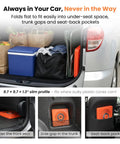 Car trunk with 4 Pack 18 Inch Collapsible Traffic Cones With Reflective Collars stored alongside bags and cooler