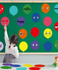 Child pointing at colorful balloon cutouts on a classroom bulletin board, each with a different emotion, from Colorful Balloon Cutouts For Classrooms And DIY Projects, 108 Assorted Hot Air Balloon Die-Cuts With 120 Glue Points, Perfect Bulletin Board Decor For Teachers, Kids Crafts, Wall Art And Classroom Displays.