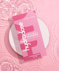 Hyaluronic Acid Vaginal Suppositories for Dryness, Hormone Free Moisturizer, FDA Cleared Medical Device, Made in USA on pink surface