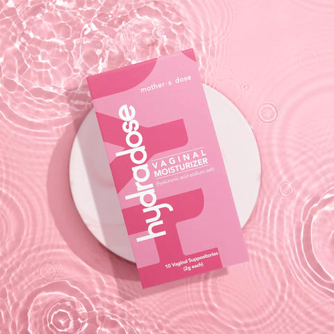 Hyaluronic Acid Vaginal Suppositories for Dryness, Hormone Free Moisturizer, FDA Cleared Medical Device, Made in USA on pink surface