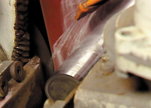 Trizact Cloth Belt 307EA A80 JE-Weight 3x132 Film-Lok used in robotic sanding on metal cylinder for smooth finish