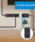 Surge Protector Power Strip With 12 Ft Extension Cord Flat Plug 6 Outlets One Wide Spaced Socket For Bulkier Plugs 500J Surge Protection 15A Circuit Breaker Wall Mountable UL Listed Black, showing one wide-spaced outlet in use with a bulky plug while mounted on a wall.