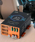 Straight Up Solid 45 Amp RV Converter 120V AC To 12V DC Smart Battery Charger installed in RV interior.