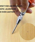 Two Piece Automatic Center Punch Set Smooth Operator Impact Punch Tool with adjustable spring grip marking a wooden surface.