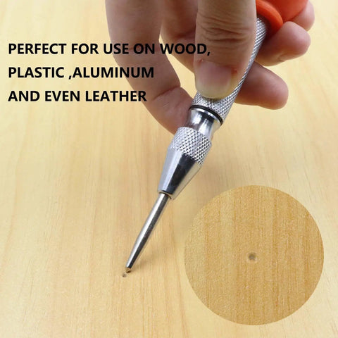Two Piece Automatic Center Punch Set Smooth Operator Impact Punch Tool with adjustable spring grip marking a wooden surface.