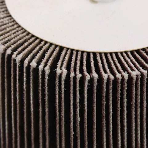 Heavy Duty 12pcs Abrasive Flap Wheels For Metal Polishing And Sanding brown discs with layered texture, ideal for sanding projects.