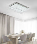 Modern Crystal Ceiling Light Chandelier With LED Fixture For Bedroom Living Room Dining Room Kitchen Rectangular 13.8 Inch White Dimmable Sleek Contemporary Ceiling Lamp above dining table in bright room.