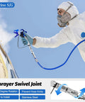 Pro Grade 3600 Psi Airless Paint Spray Gun Kit With 25 Foot High Pressure Hose Five Swappable Tips And Extension Rod in use by a masked painter.
