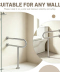 Rock Solid 32X28 Inch Brushed Nickel Toilet Grab Bar With T Shape Leg Heavy Duty 304 Stainless Steel Anti Slip Safety Rail next to a toilet.