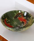 Koi And Lily Pond Glass Vessel Sink With Tempered Glass, 16.5 Inch Diameter By 5.75 Inch High, European Design, on a countertop.