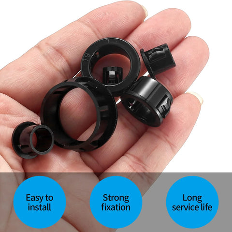 Hand holding various sizes of black nylon cable snap grommets from the 170 Pcs Black Round Nylon Cable Snap Grommets Set Durable PA66 Material