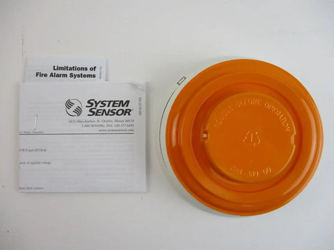Photoelectric Smoke Detector With Thermal Sensor, Plug In Design, 12 24 VDC, Integrated Sounder And Base next to manual