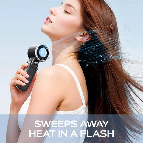 Woman using Portable Handheld Fan With Ice Cooling Tech, 5 Speed Turbo Personal Mini Fan, USB Rechargeable for instant cooling.