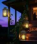 Outdoor Solar Lanterns 14 Inch Hanging LED Lights, 2 Pack, illuminating porch steps at dusk with a dog lying nearby