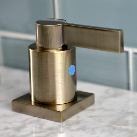 Close-up of Antique Brass Widespread Bathroom Faucet With Drip Free Ceramic Disc Cartridge Deck Mount Eight To Sixteen Inch