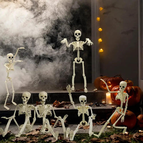 Six 16 Inch Full Body Poseable Skeletons With Movable Joints For Halloween Indoor Outdoor Spooky Decor in yard display.