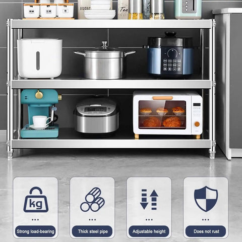 Heavy Duty Stainless Steel Shelving Unit Badass Three Shelf Storage Rack For Kitchen Garage And Commercial Office with pots and appliances.