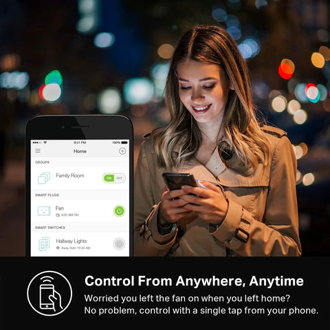 Woman controlling Smart Plug Mini 15A With HomeKit Siri Alexa And Google Home Support via smartphone app outdoors at night