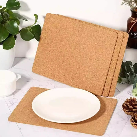 Ten Piece Natural Cork Self Adhesive Sheets Eight Point Three By Eleven Point Seven Inches One Millimeter Thick placed under a white plate.