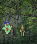 Hanging on a tree branch, Six Pack Five Point Nine Inch Poseable Mini Skeleton Figurines Distressed Plastic Skeletons For Crafts And Halloween Decor