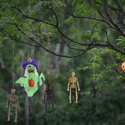 Hanging on a tree branch, Six Pack Five Point Nine Inch Poseable Mini Skeleton Figurines Distressed Plastic Skeletons For Crafts And Halloween Decor