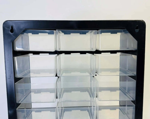 Close-up of clear drawers on wall mountable 18 Drawer Parts Organizer In Matte Black Finish For DIYers And Pros.