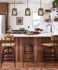 Farmhouse Pendant Light With Industrial Metal Wire Cage In Oil Rubbed Bronze hanging over kitchen island with stools