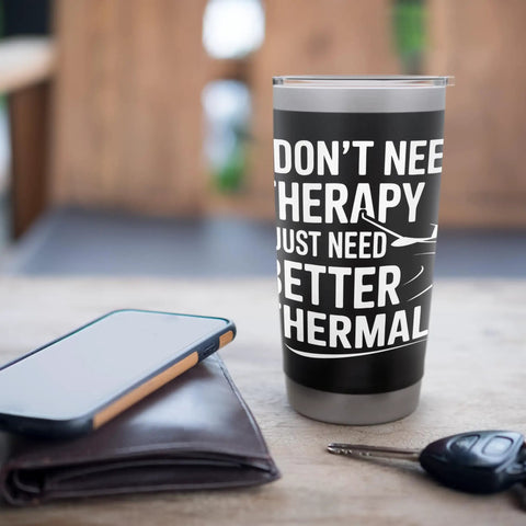Insulated Stainless Steel Tumbler For Sailplane Pilots And Glider Fans The Go To Travel Mug on table with phone and keys