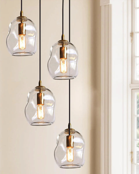 Dope Clear Art Glass Pendant Lights 2 Pack For Kitchen Island And Dining Room Table Modern Organic Globe Ceiling Fixture with sleek brass gold hardware hanging.